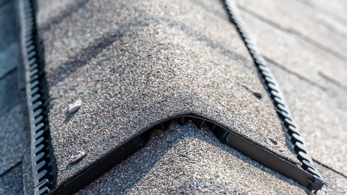 Close-up of the ridge vent on shingle roof