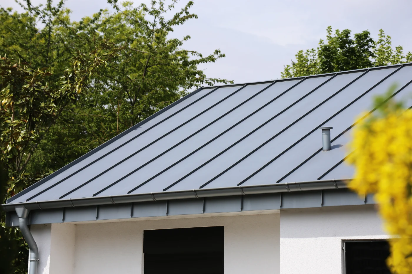 A standing seam metal roof.