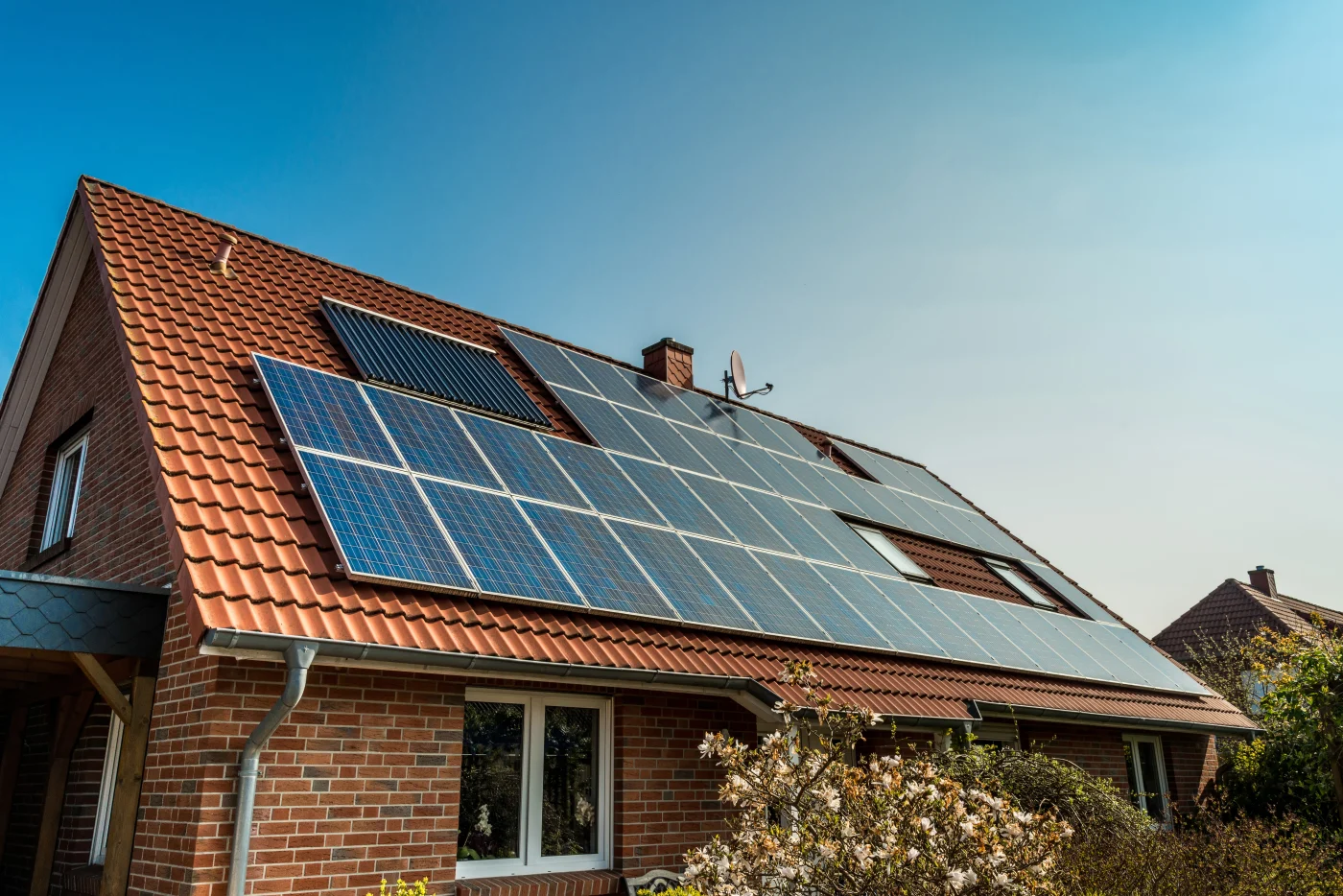 Solar panels installed on a home with a tile roof.
